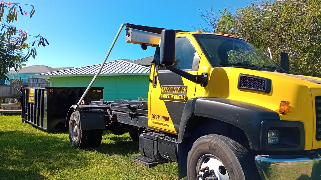 Throw and Go roll-off truck serving contractors in Corpus Christi